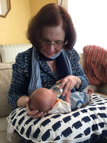 With her baby grandson in Boston.