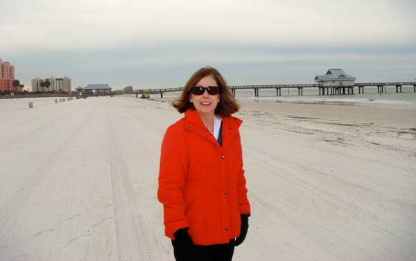 Dr. Patti enjoying a winter beach trip.