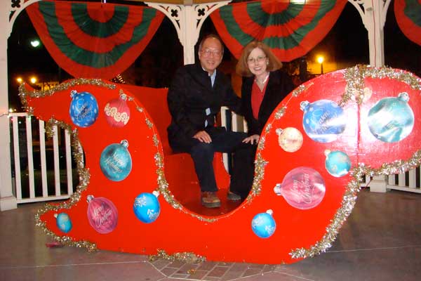 Dr. Patti and her husband on a Christmas sled date in Orlando.
